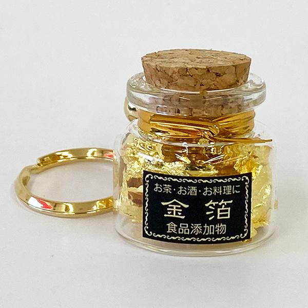 金箔ビン入(大)瓶サイズ：φ29×28ｍｍ 本体重量:8.8g内容量：約0.019g　純度22.7成分重量（金/94.438％ 銀/4.901％ 銅/0.661％）金箔４号色● お菓子や料理にほんの少し飾りつけるだけで豪華な雰囲気を演出でき...