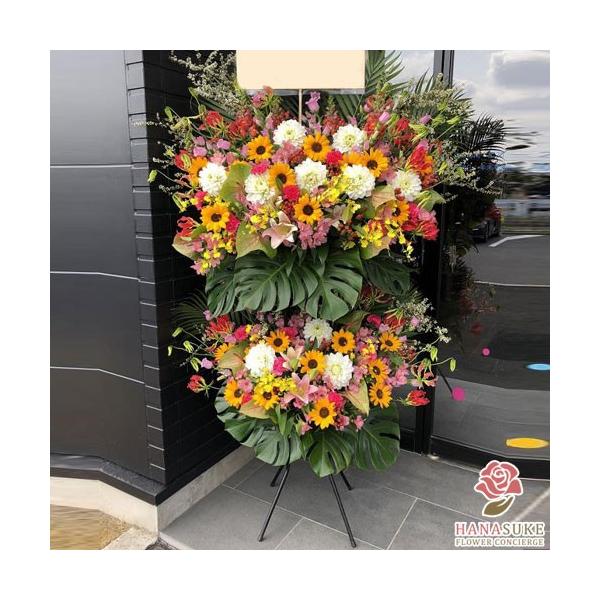 【最短出荷日】15時までのご注文で最短即日配送。午前中のお届けをご希望の場合、前日15時までにご注文ください。【お届け内容】御祝いスタンド花画像は一例です。使用するお花は季節、仕入れ状況により異なるので仕上がりはお任せとなります。【サイズ】...