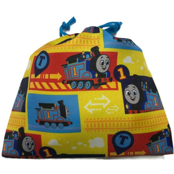 人気の駄菓子の中から７大アレルゲン不使用の駄菓子を選んでお作りします。７大アレルゲン不使用の駄菓子４品を きかんしゃトーマス 巾着袋に入れた可愛い お菓子 詰め合わせです。お菓子の内容はハッピーターン、こんにゃくゼリー、あべっ子ラムネ、星の...