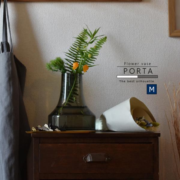 ●サイズMサイズ：16.7cm丸×20cm (口径部：約6.5cm)●組成ガラス●商品説明・定番のクリアガラスと、当店の人気カラーであるグレー展開のフラワーベース。デザイン性も高く、裾広がり形状なのでお花も挿しやすい。・そのままでもオブジェ...