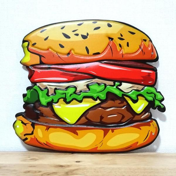 「ブリキ看板 ”Tasty Humburger”」見ているだけでお腹が空いてくる！ボリュームたっぷりの美味しそうなリアルなチーズバーガーのブリキ看板！表面はアンティーク感あるビンテージエンボス加工で、独特な色味は食欲をそそられます。これこそ...