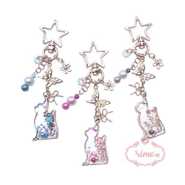 おしゃれなチャーム。rimoオリジナルの商品です！●サイズ全　　長：約１０．７ｃｍ ね　　こ：約３．５ｃｍ モニターの発色具合により実際の商品と色が若干異なる場合がございますのでご了承ください。可愛いラッピングでお届けしています。