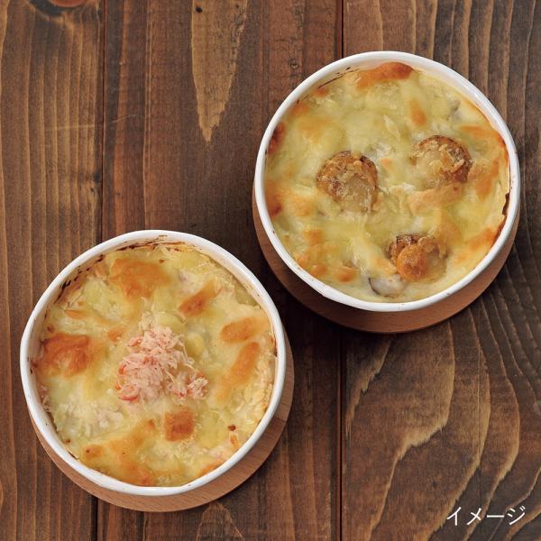 函館朝市すずや食堂の味です。ズワイガニと北海道産チーズと生クリームで仕上げたかにグラタンと北海道産帆立と北海道産チーズと生クリームで仕上げた帆立グラタンです。