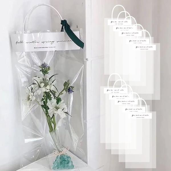 バリエーションコード : 2B41J86N69・片手で持ち運びができる、透明タイプの手提げフラワーバッグ、OPP袋です。シンプルでオシャレなデザインですので、ギフト用・プレゼント・ラッピング袋として人気の商品です。・3サイズのラインアップS...