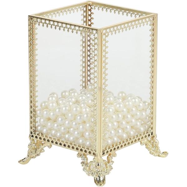 バリエーションコード : 2BUF58RLW2エレガントなパールとゴールドのフレームが魅力的なメイクブラシスタンドです。ガラス製の透明なボックスにパールが敷き詰められ、インテリアとしても美しく、メイクスペースを華やかにしてくれます。蓋付きの...