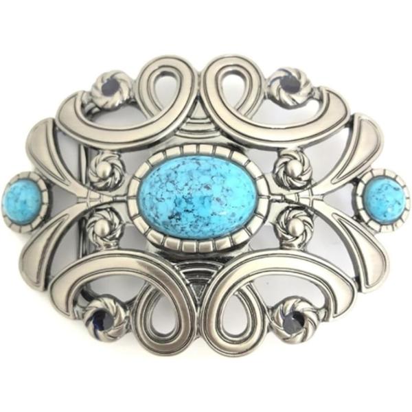 「華やかなデザイン」 ターコイズのイミテーションストーンが輝く、上品で華やかなバックル.存在感のあるデザインで、ベルトカスタマイズに最適。目を引くおしゃれなアイテムです「シルバーxターコイズの魅力.」 シルバー金具とターコイズが美しく調和し...