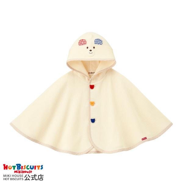 ミキハウス ホットビスケッツの顔ドン おでかけポンチョ。人気の顔ドンシリーズのおでかけポンチョです。立体的な耳やくまシルエットのカラフルなボタンがかわいらしいデザイン。カーディガンなどのお袖に腕を通すのが苦手なベビーちゃん。ポンチョなら、パ...