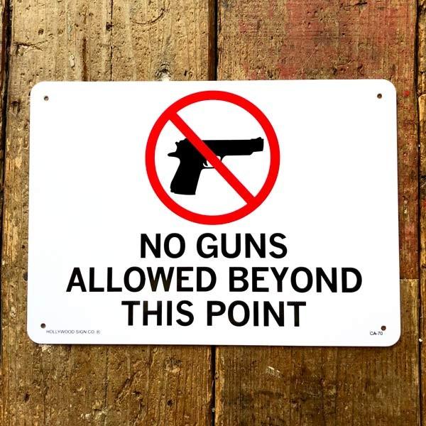 vX`bNTC{[h eK NO GUNS ALLOWED BEYOND THIS POINT AJG K[W Ŕ CeA