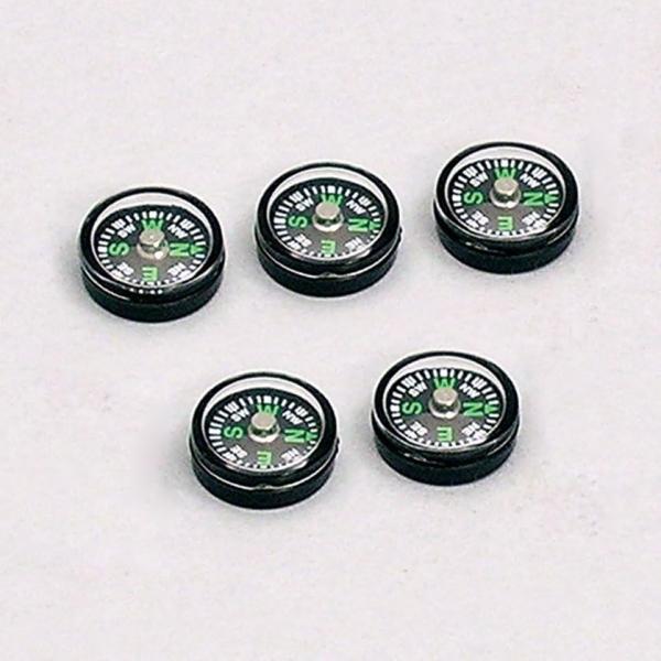 超小型コンパス。5個入りです。オイルコンパスではなく、ドライコンパスです。大人の爪の大きさほど（Φ1.4cm）の極小の方位磁針です。方位磁針といっても針ではなくN・E・W・Sと書かれた文字盤が動きます。いろいろなところに忍ばせておけば方向を...