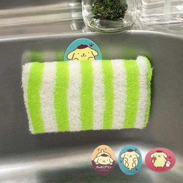 サイズ/約横4×縦4cm内容量/3個入り材質/ポリプロピレンカラー/ポムポムプリン生産国/日本製●表面の目に見えない突起が繊維を引っ掛け、フックに早変わり。●裏面の粘着シートで壁やシンクにピタっと貼れます。●シンクに貼り付けると食器洗いスポ...