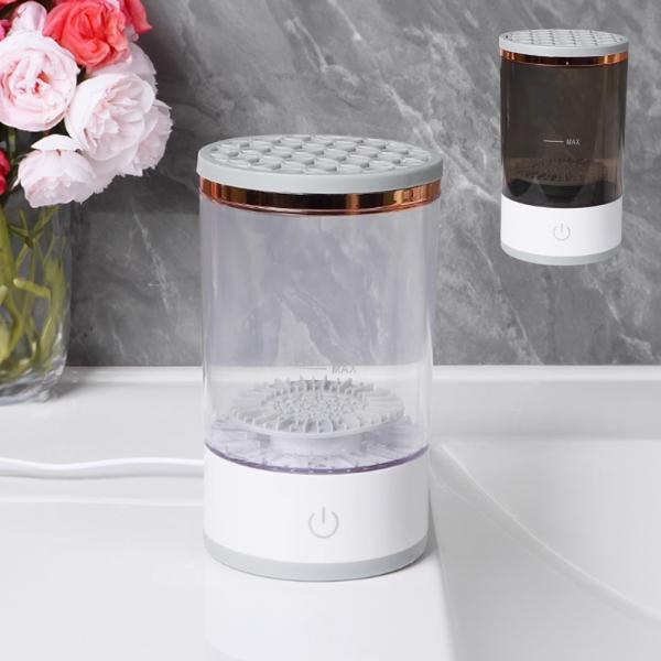 電動メイクブラシクリーナー【ホワイト ブラック】メイクブラシを手軽に清潔に保つための理想的なアイテムです。水洗い可能な設計により、ブラシの汚れをしっかりと落とし、衛生的な状態を維持します。使い方は簡単で、電動機能により短時間で効率的にクリー...