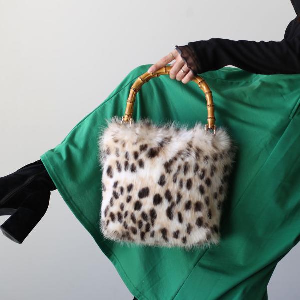 重量：約260g≪単位cm≫【サイズ】 横幅31/高さ25/厚み5/ハンドル立ち上がり13/ハンドル周囲41【素材】表側：ポリエステル内装：生地持ち手：バンブー(竹)【原産国】中国(縫製)【内側収納】フリーポケット×2【外側収納】ポケットな...