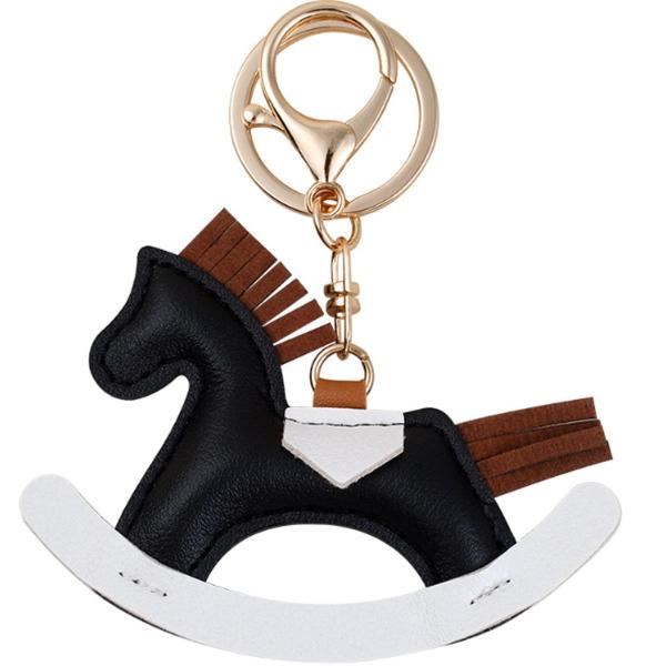 バッグや鍵を簡単に彩る、愛らしいロッキングホースキーホルダー。レザー調素材に上品なステッチ、ゴールド金具が魅力。馬好きへのギフトにも最適な多用途アイテム。　分類タグ:  【その他 雑貨など】  【ブラック】  【ブルー】  【ブラウン】  ...