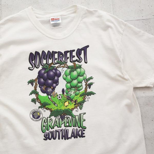 中古ヘインズ Hanes グレープバイン・サウスレイクサッカー協会 キャラクター イラスト Tシャツ プリント Lサイズ ホワイト 白 古着 UR-0530