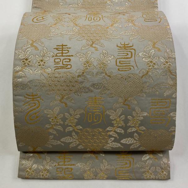 袋帯 逸品 龍村晋 落款あり 名物寿橘金襴 橘 文字 箔 金糸 灰色