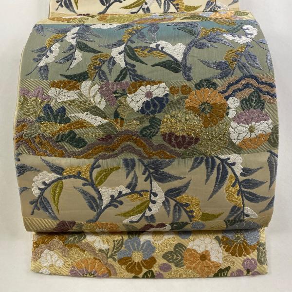 ムガシルク 金彩花唐草ライトベージュ全通柄 名古屋帯 (袋帯としても)極美品 袋帯 秀品 草花 横段 金糸 唐織 ベージュ 六通 正絹 中古