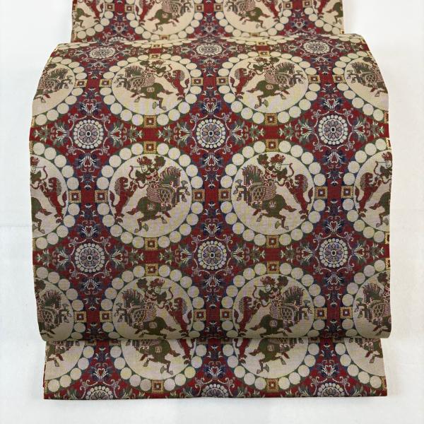 美品 開き名古屋帯 名品 龍村美術織物 狩猟文 華文 えんじ色 正絹 中古