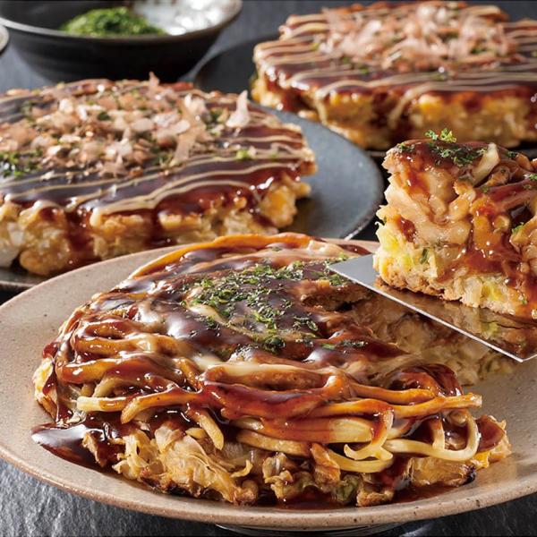 ■商品説明大阪で人気のお好み焼き店「ゆかり」と「鶴橋風月」のお好み焼き味比べセットです。職人が1枚ずつ手焼きで仕上げた、本場大阪の味がレンジで簡単にお楽しみいただけます。■商品詳細内容：ゆかり(もちチーズ焼・海鮮焼)×各2、鶴橋風月(モダン...