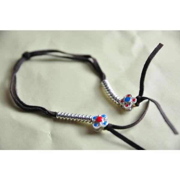 ネパールのマラ(数珠)につける法具です二つで一対になっています何度数珠をくくってお祈りしたかをこのチュプセのビーズを動かして確かめるカウンターです