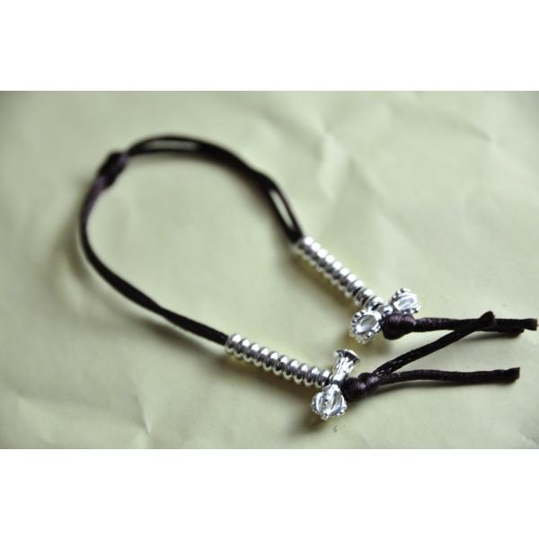 ネパールのマラ(数珠)につける法具ですドルジェとティルブ(ガンター)で一対になっています何度数珠をくくってお祈りしたかをこのチュプセのビーズを動かして確かめるカウンターです