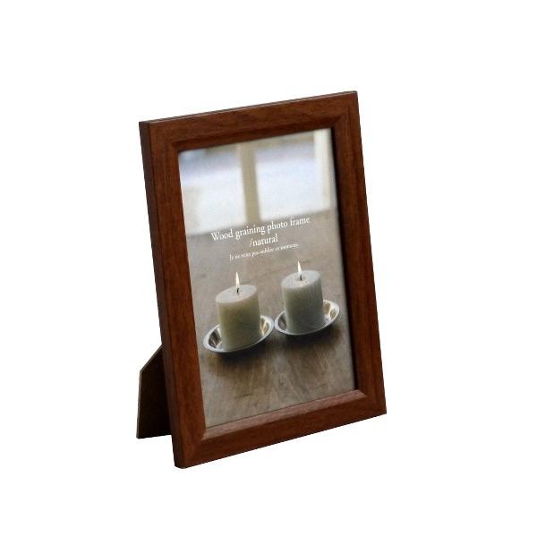 ○温かみのある木目調のナチュラルフォトフレームです。窓枠の内寸（写真の見える所）は約１６．８×１１．８ｃｍです。２Ｌ判サイズ（１７．８×１２．７ｃｍ）の写真を入れることができます。縦置き・横置きのどちらでも使用することができます。シンプルな...