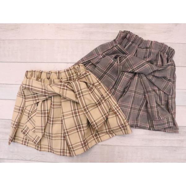 チェック柄が可愛いキュロットパンツです。腰巻き風のデザインがオシャレ。気温によってレギンスやタイツを合わせても◎コーディネートの主役になること間違いなしです！〇素材：【本体】 ポリエステル71%  綿22%  レーヨン6%　ナイロン1％〇カ...