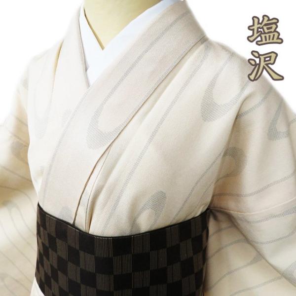 塩沢 お召し 御召 着物 中古 正絹 袷 カジュアル 曲線模様 練色 黒色  