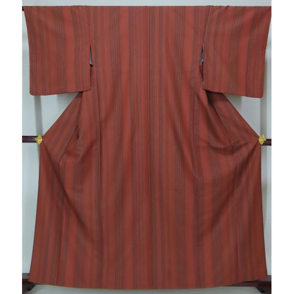 小紋　袷　裄65.5cm　身丈156cm　ポリエステル　レンガ色　【中古】美品　pk1770rym　（配送方法お任せ／代引き不可）