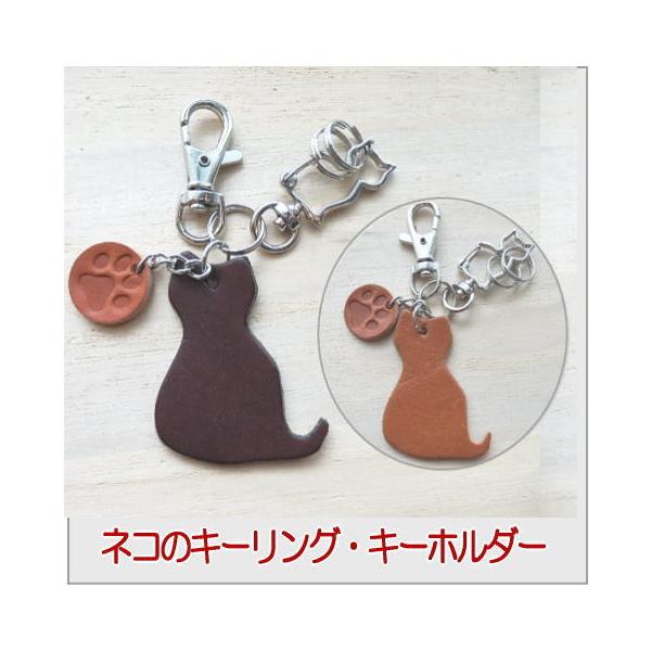 猫と犬の骨の単純な線画を保護する動物のペットの恋人 回転キーホルダーリングキーホルダー