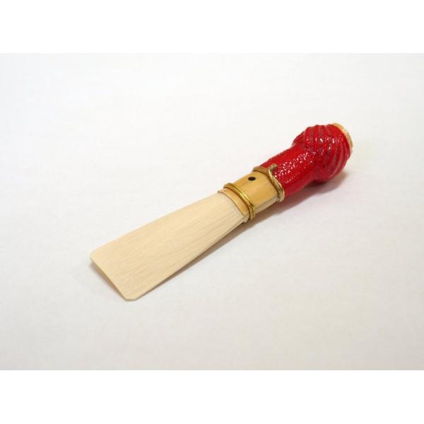 ファゴットの完成リード糸：赤、硬さ：MH※リードにつけられた「・」印を上側にセットしてお使いください