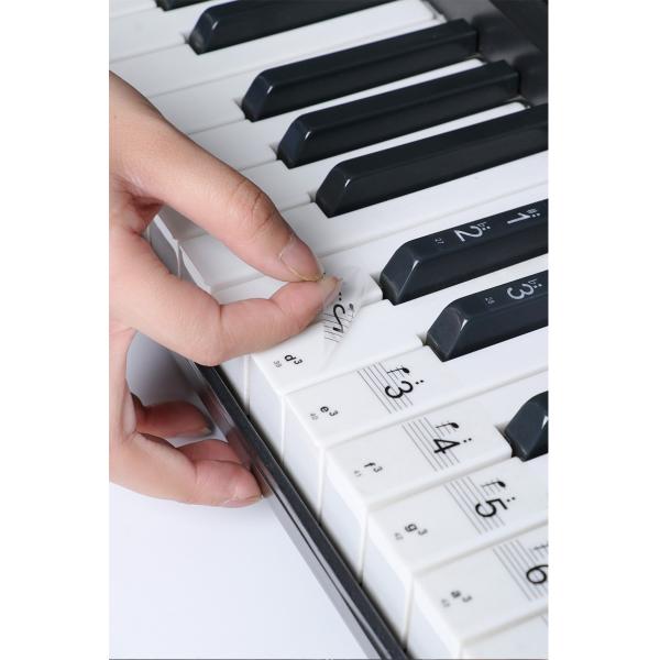 【初心者の方、大歓迎！】 音符と音階（ドレミ）がひと目でわかる、透明タイプのピアノキーボードステッカーです。【幅広い鍵盤サイズに対応】 88鍵、61鍵、54鍵の電子ピアノやキーボードにぴったりフィットします。【楽譜を読むのが ???? に！...