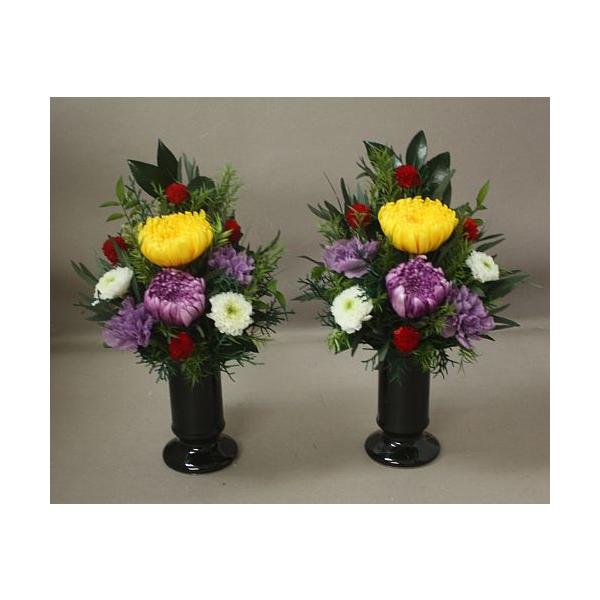 輪菊・カーネーション・小菊・千日紅サザンカの葉・ラスカス・ストーベ等グリーンもすべてプリザーブド使用ですご注文いただいてからお作りいたします同じようにお作りいたしますご注文いただいてから３〜１０日後の発送になりますサイズは約ですが高さ３０c...