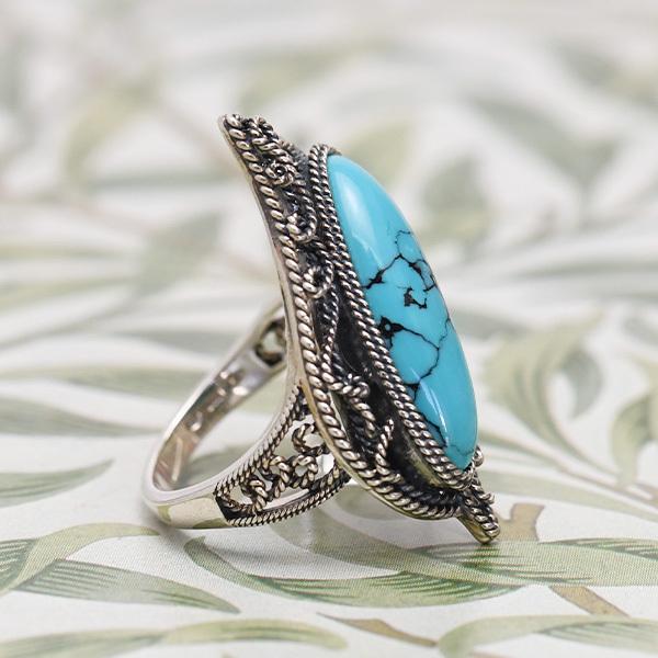 現品限り】 碌山 ターコイズ 女神の羽 リング 大粒トルコ石の力強い