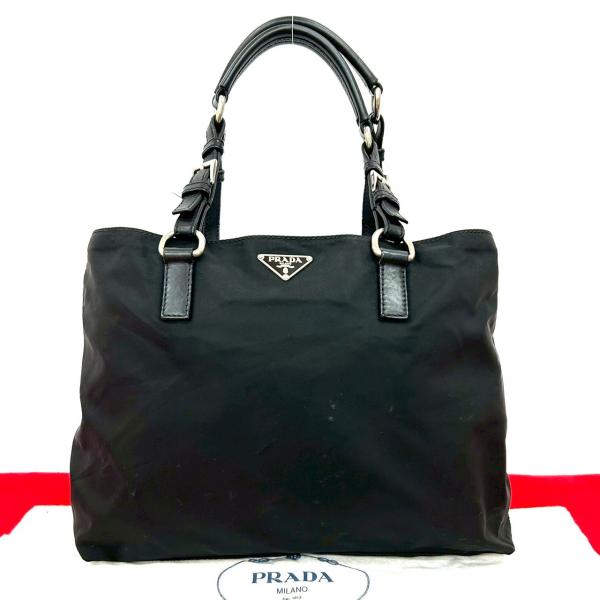 PRADA（プラダ） 極 美品 袋付き 三角ロゴ プレート 金具 レザー 本革