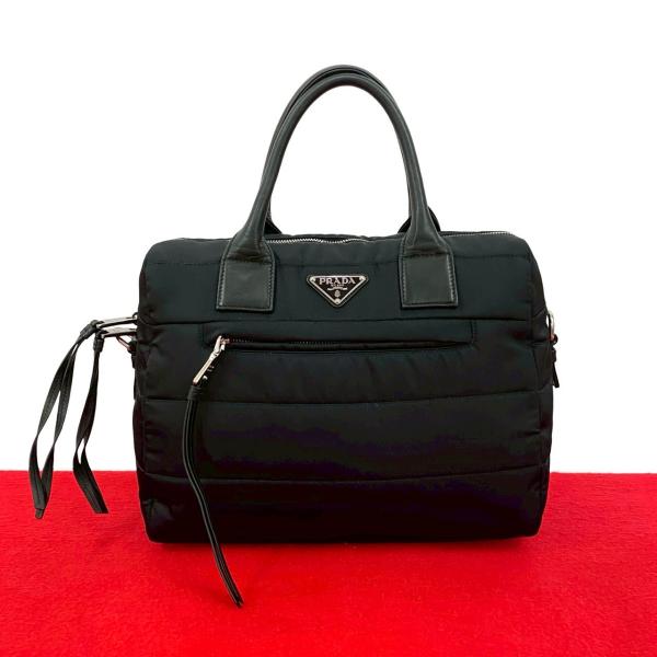 PRADA（プラダ） 極 美品 希少品 テスートボンバー 三角ロゴ 金具