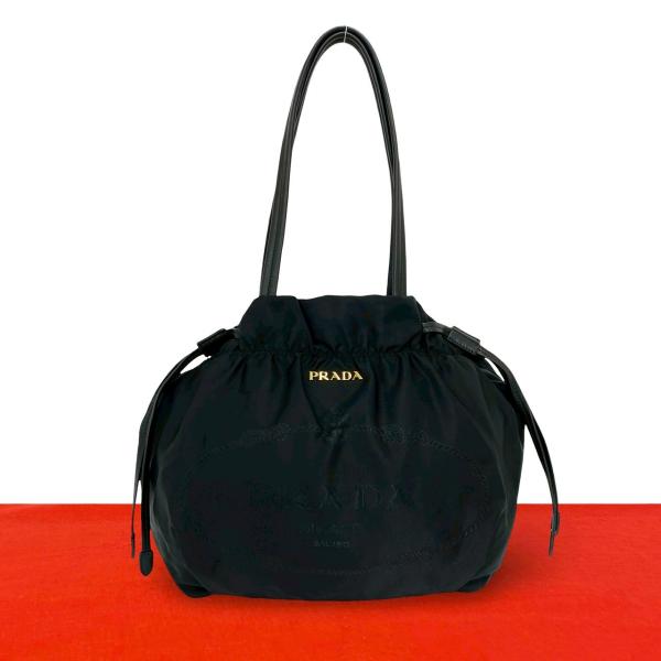 PRADA（プラダ） ほぼ未使用 ロゴ 金具 テスート ナイロン レザー 本革