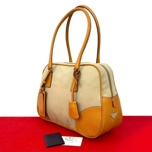 ✨美品✨プラダ トートバッグ メタルロゴ ゴールド金具 A4可能 レザー 黒 PRADA（プラダ） 極 美品 三角ロゴ 金具 キャンバス レザー 本革