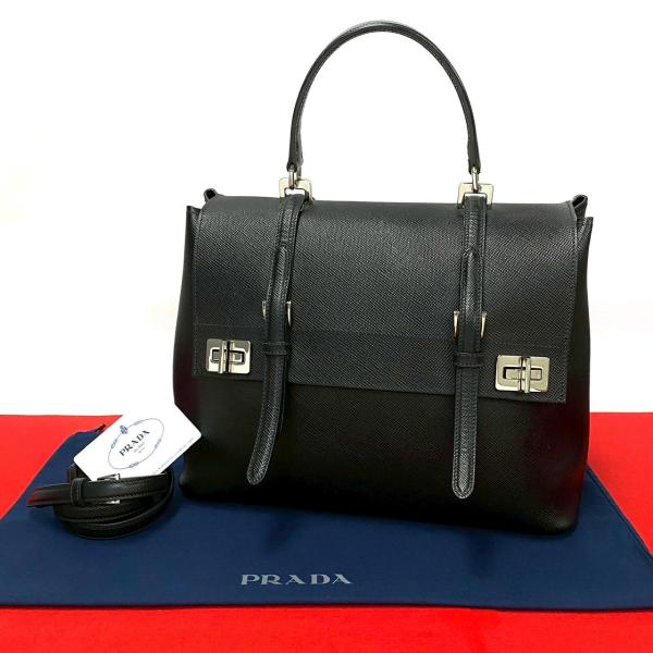 PRADA（プラダ） 極 美品 希少品 ロゴ 金具 ターンロック レザー 本革