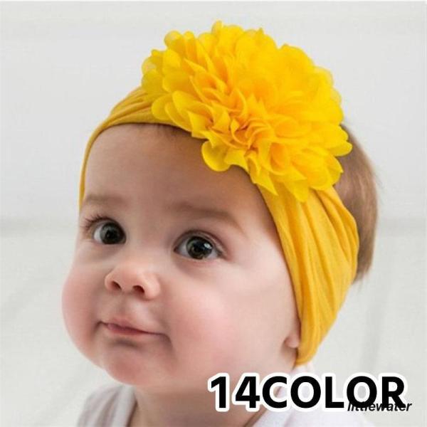 大きな花の飾りがついたベビー用のヘアバンドです☆カラバリ豊富なのでお好みのカラーをお選びください?※お花部分は切りっぱなしとなっておりますため多少の糸のほつれがある場合がございます※【サイズについて】※画像をご参照ください【素材について】ナイロン