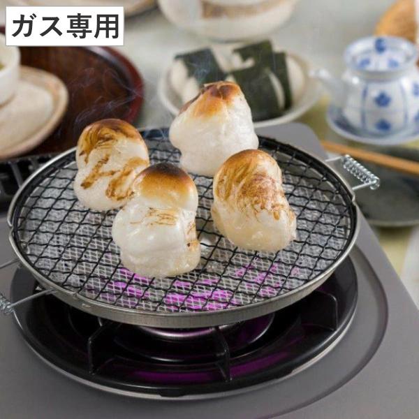 サイズ/約高さ1.75cm直径：約22cm内容量/1枚材質/セラミック：ラス+主原料石膏受皿：ET銅版焼アミ：鉄線(フッ素樹脂加工)取手：鉄(メッキ加工)生産国/中国製熱源/ガス火専用●フッ素コートアミでおもちがこびりつきにくく、きれいに焼...