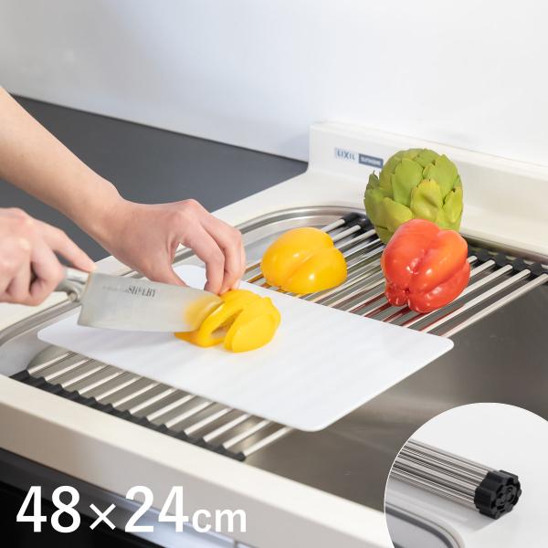 サイズ/約幅24×奥行48×高さ0.8cm重量/約280g内容量/1個材質/本体：ステンレス鋼キャップ：シリコーンゴム生産国/中国製パーツ別耐熱温度/キャップ：200度耐荷重/約5kg●クルクルまとまってすっきり収納できる水切りラックです。...