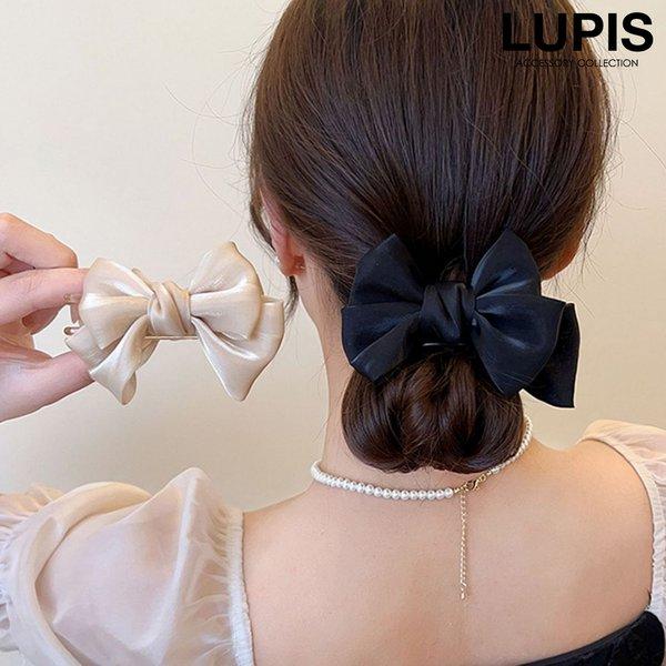 品番 : v2638サイズ : 高さ約9cm × 横幅約2cmモチーフサイズ : 横幅約8.5cm × 高さ約6cmその他 : モニター・撮影環境により実際の商品と色味が異なる場合があります。商品の説明リボンが上品でかわいいスリムバンスクリ...