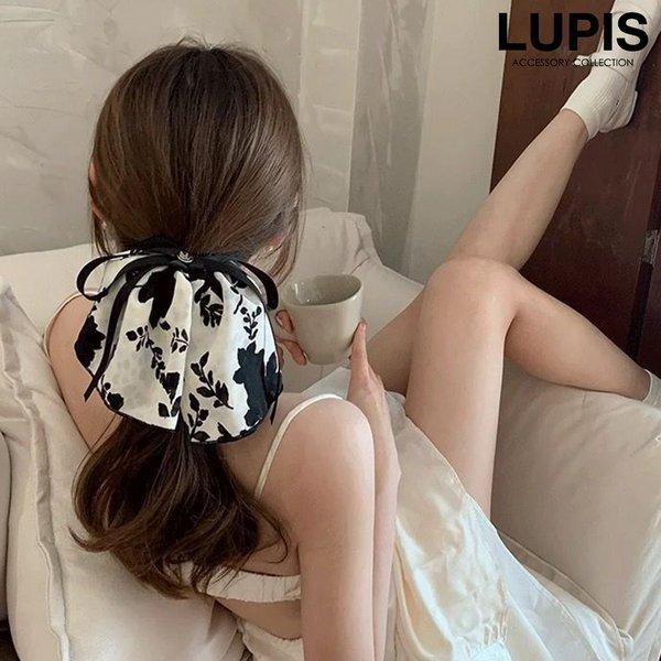 品番 : v2651サイズ : (シュシュ)直径約8cmモチーフサイズ : 長さ約12.5cm※個体差ありその他 : モニター・撮影環境により実際の商品と色味が異なる場合があります。商品の説明レトロシックな雰囲気のフラワー柄リボンシュシュ。...