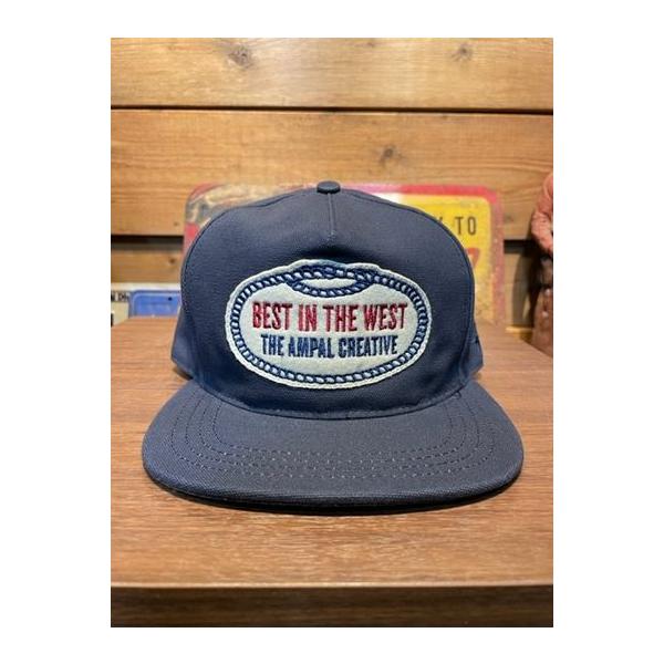 アンパルクリエィテブ/THE AMPAL CREATIVE キャップ BEST IN THE WEST NVY Strapback