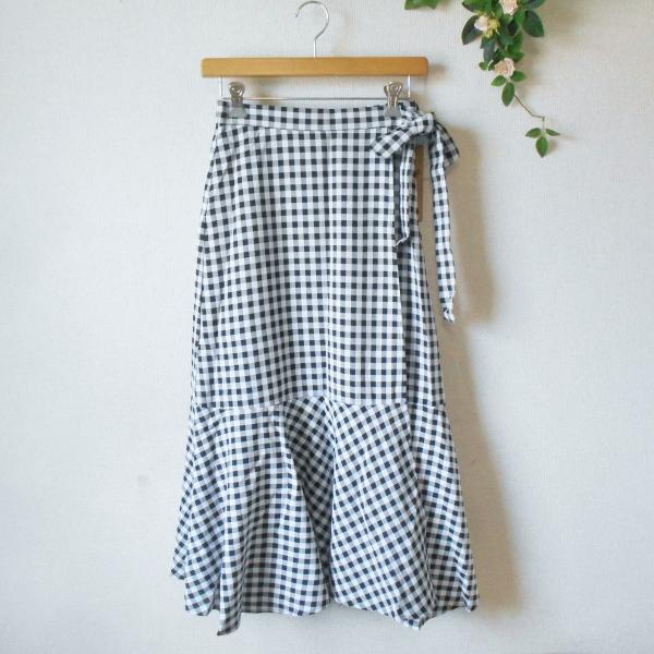 韓国ルコック　トップスとスカートセット　新品未使用タグ付きです　定価49555円 OZOC 新品 タグ付き 5990円 オゾック 巻き スカート ラップ