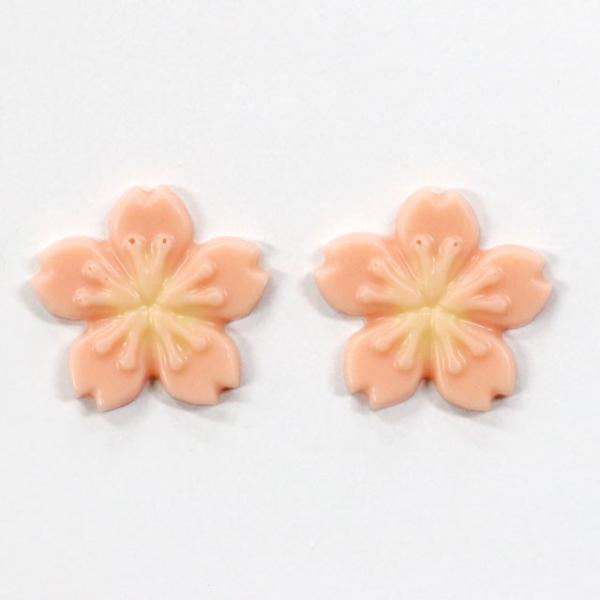 さくらの季節にぴったりなふんわりと優しいピンク色が特徴のチョコレートです。ひな祭りや入園、入学シーズンに花を添えてくれる桜の花びらが可愛いですね♪ケーキやタルトなどのトッピングにいかがですか♪■製品規格28×27mmH