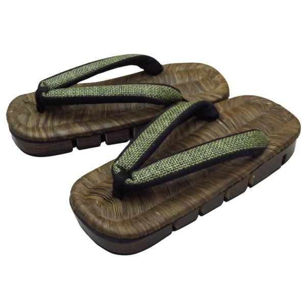 ・とてもお洒落で伝統的な桐八割れ下駄です。・竹皮を染めた表（カラス表）で編んでいるのでシックで高級感があり足ざわりも気持ちが良いです。・通常の下駄より足に馴染んで歩きやすいように下駄の台に切り込みを入れています。・鼻緒はクッションのようにふ...