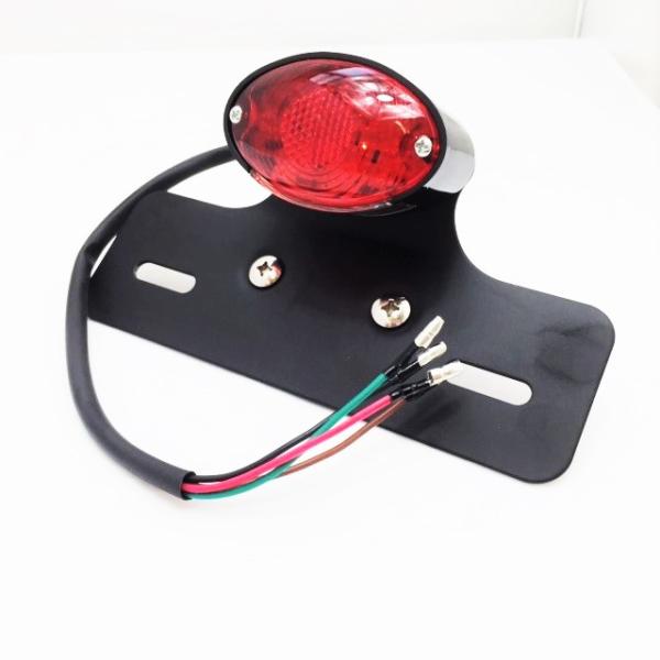 ■LED キャッツアイ テール ナンバーステー■取り付け車種を問わない汎用パーツ!! ■デザインはシンプルなオーバルタイプ。 　■昔ながらのキャッツアイテールランプを少しコンパクトに仕上げたミニキャッツアイタイプで ストリート、アメリカン、...