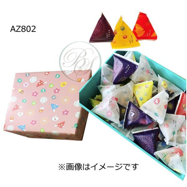 ショップ袋付それぞれのかりんとを食べきりの量で色々なお味をお楽しみいただけます。内容量　三色あられかりんと、黒糖丸かりんと、りんご丸かりんと、梅鉢かりんと、メイプルシュガーかりんと、柚子丸かりんと、カレーかりんと、カプチーノかりんと