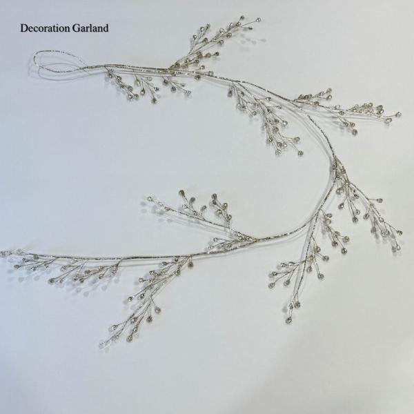 120ｃｍデコレーションガーランド繊細なゴールドのワイヤーに透明感のあるベリー型オーナメントをあしらった120cmのデコレーションガーランドです。枝先の立体感あるデザインが、ツリーやリース、窓辺やテーブルコーディネートにも映えます。しなやか...